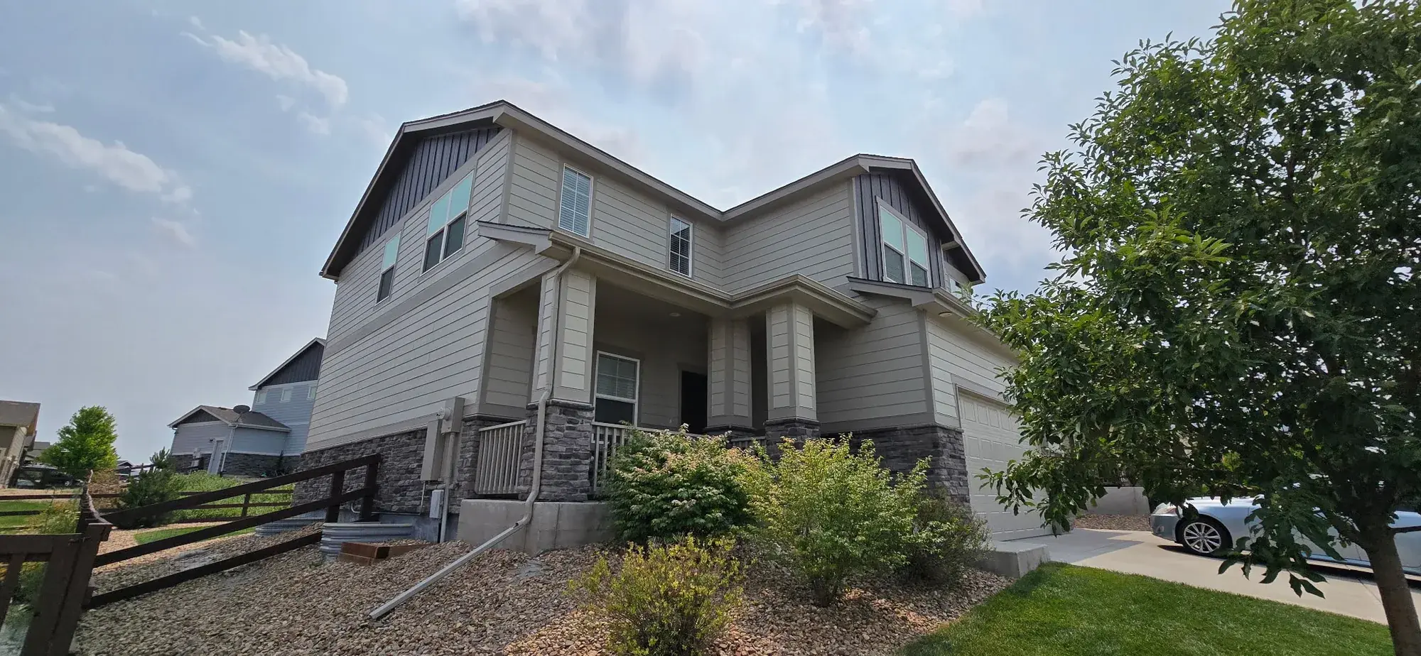 Finished gray residential exterior from Mach Paint Co.